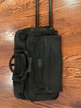 Tumi rolling carryon duffel bag